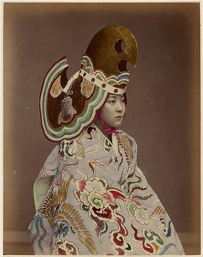 [Performer in Bugaku-style Costume]