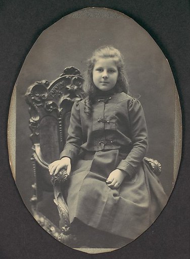 [Girl with Ringlets, Seated, Three-Quarter Length]