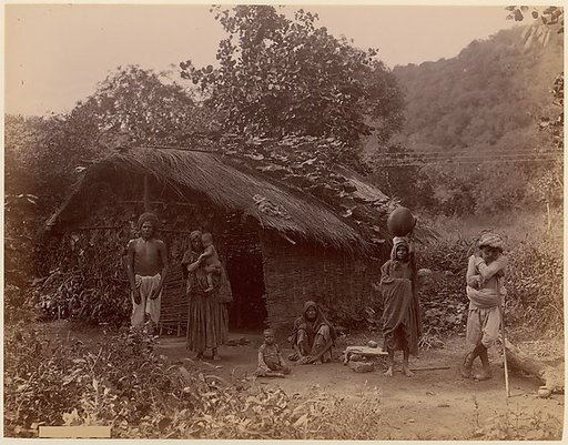 [Thatched House, People in Foreground, Telegraph Lines in Background]