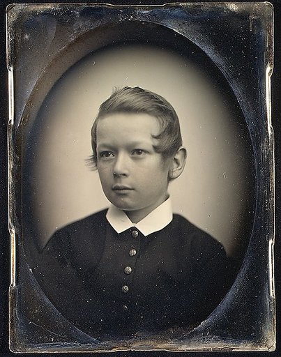 [Unidentified Boy in Dark Suit]