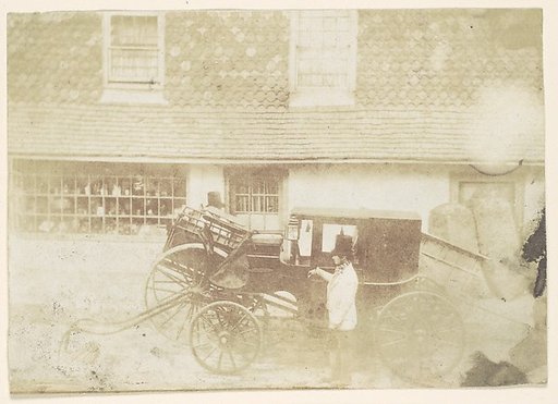 [Men By Carriage in Street]