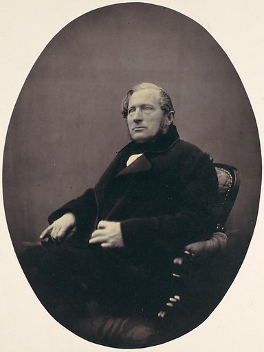 [Man Seated in Armchair]