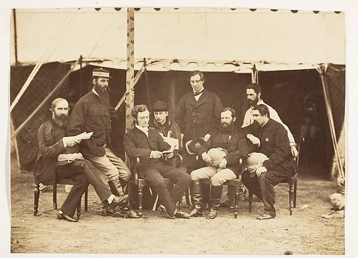 [Group Portrait: (L-R)Col.Yule P.W.D., Major Jones A.D.C., Mr. Walters, Captain Stanley A.D.C., Captain Baring A.D.C., Captain Roberts V.C.D.A.Q.M.G., Captain Hills V.C. A.D.C. and Sir E. Campbell Bart. Mry. Secry.]