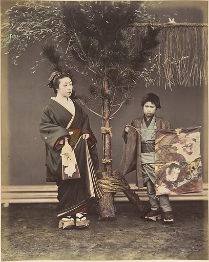 [A Japanese Woman and a Japanese Boy in Traditional Dress]