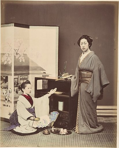 [Two Japanese Women Posing with Fans]