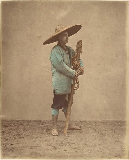 [Chinese Man Wearing Hat]