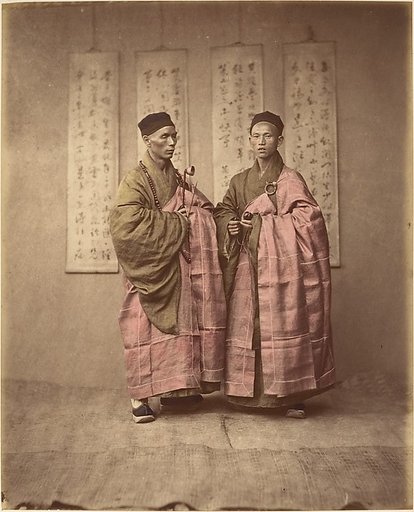 [Two Chinese Men in Matching Traditional Dress]