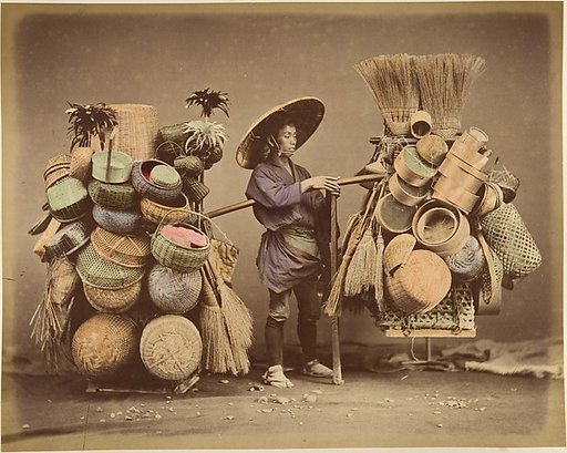 [Japanese Man Posing with Baskets, Brooms and Feather Dusters]