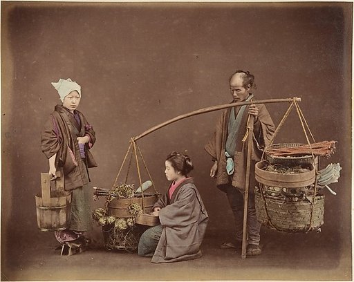 Two Japanese Women and One Japanese Man Posing with Water Bucket and Baskets]