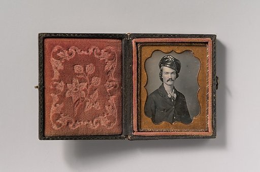 [Man with Mustache Wearing Oilskin Hat]