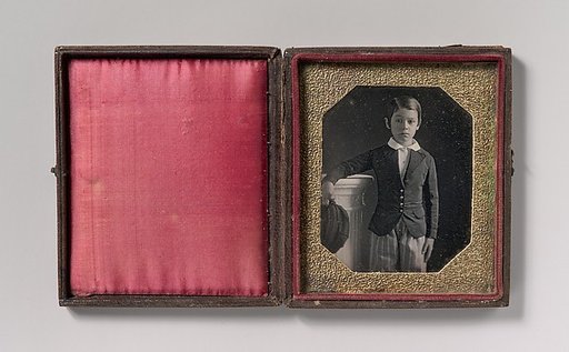 [Boy Holding Cap, Resting Arm on a Column]