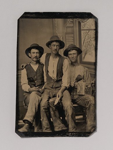 [Three Painters, with Brushes and a Can of Paint, in Front of a Painted Window Backdrop]