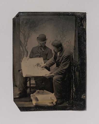 [Two Men Reviewing Plans]