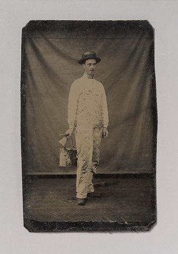 [Painter in Paint-spattered Overalls with Brushes and Paint Can]