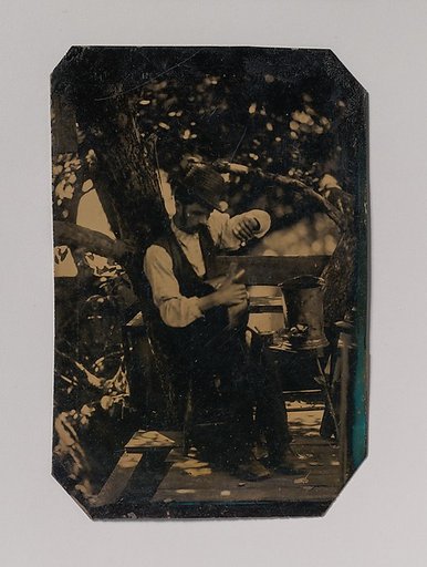 [Tinsmith Working Under a Tree]