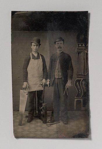 [Two Carpenters with a Handsaw, Wood Plane, Hammer, Compass, and Square]