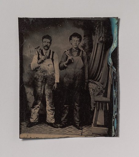 [Two Plumbers in Overalls]