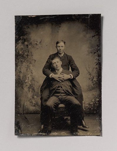 [Two Young Men, One Embracing the Other]