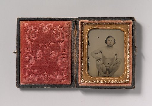 [Nude Man Squatting on Chair]