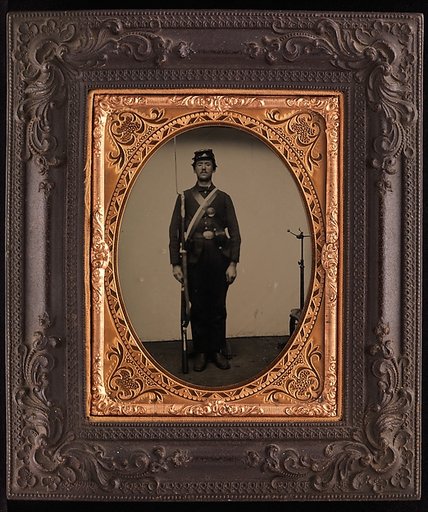 [Union Soldier Holding Rifle, with Photographer's Posing Stand]
