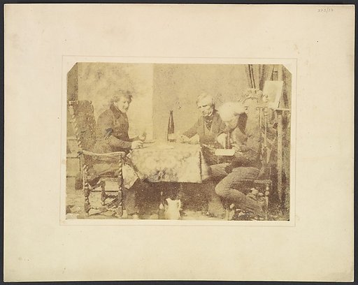 Group of Gentlemen Conversing over a Glass of Wine