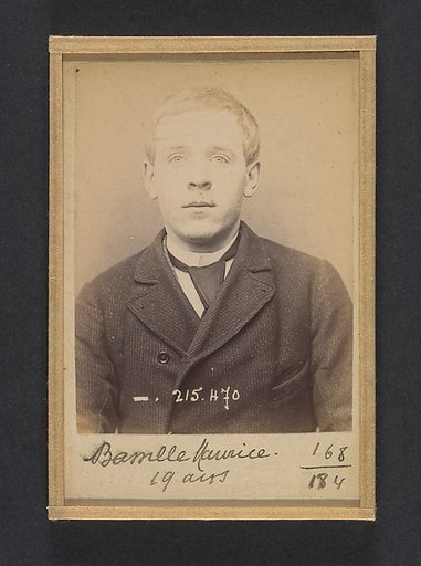 Bassille. Maurice, Eugène. 19 ans, né à Paris Ille. Portefeuilliste. Anarchiste. 9/3/94.