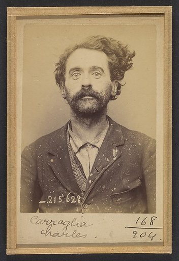 Carraglia. Charles. 39 ans, né à Moceto (It). Homme de lettres. Anar, infraction à la loi du 21/6/73. 13/3/94.