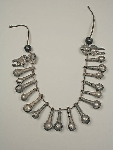 Necklace with bells and two figures