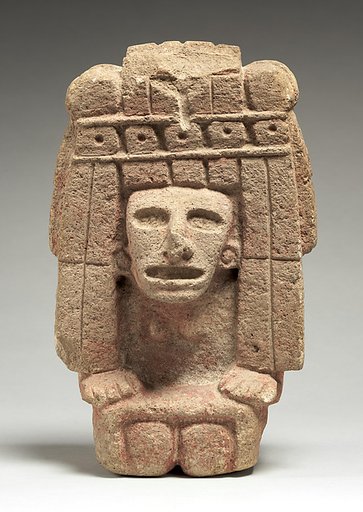 Kneeling female figure with tasseled headdress
