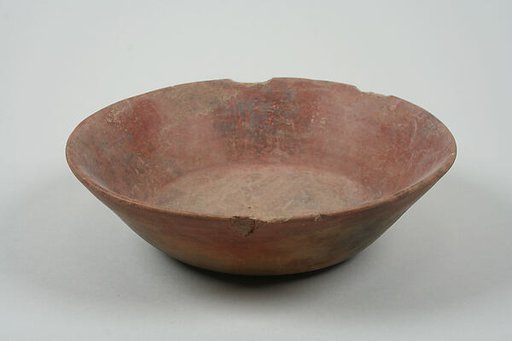 Undecorated painted bowl with flaring sides
