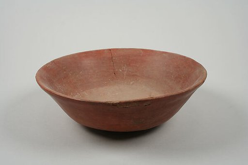 Undecorated painted bowl with flaring sides