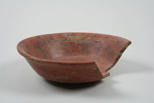 Undecorated painted bowl with flared sides