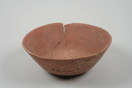 Undecorated painted bowl with flared sides