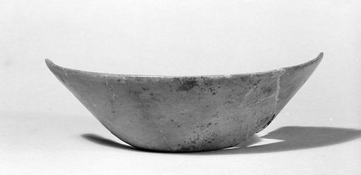 Undecorated painted bowl with flared sides
