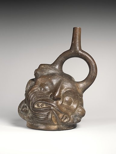 Tuber-inspired stirrup-spout bottle