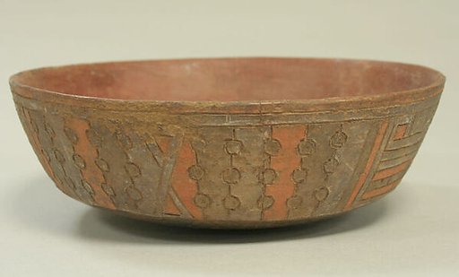 Incised Painted Bowl with Feline Faces