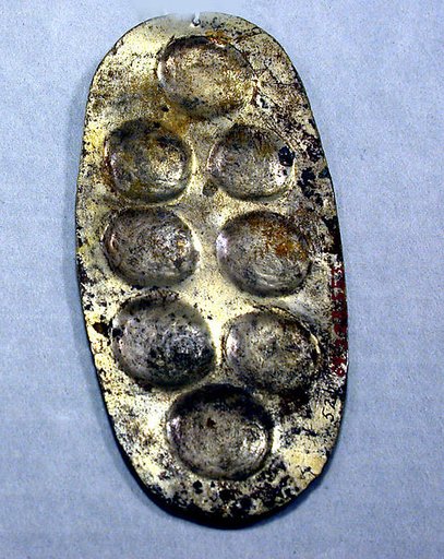 Hammered Silver Ornament with Repoussé Disks