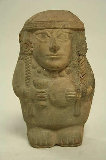 Standing Ceramic Figure Holding Disk