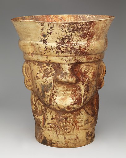 Beaker with figure and Spondylus shell