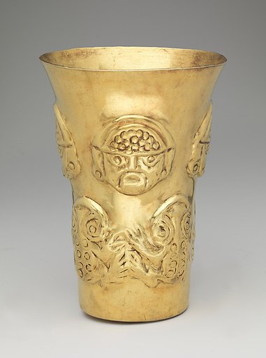 Beaker with heads and toads