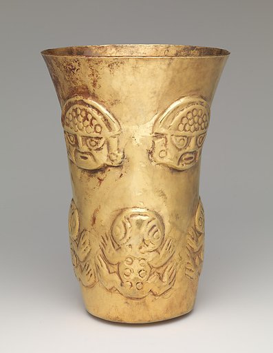 Beaker with heads and toads