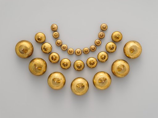 Necklace with conical beads