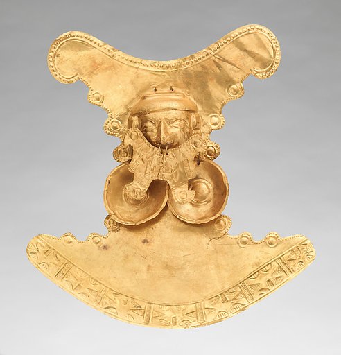 Pectoral with face