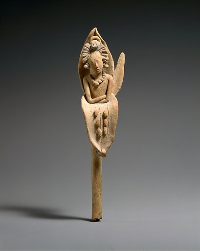 Whistle with the Maize God emerging from a flower