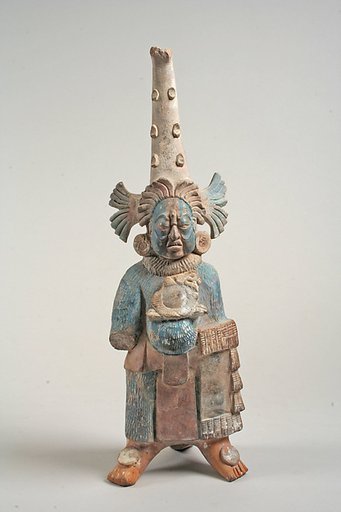 Figure with conical headdress and shield