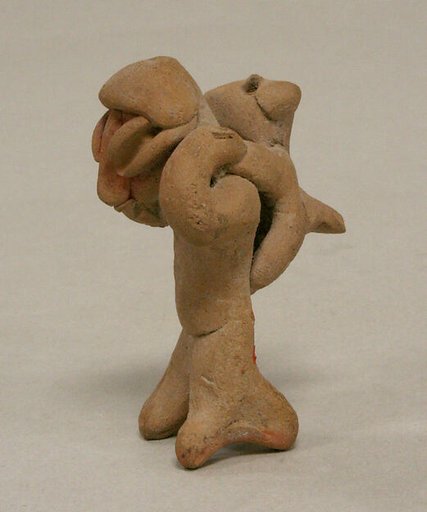 Figure with Animal on Back