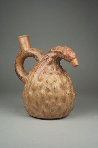 Stirrup-spout bottle with squash