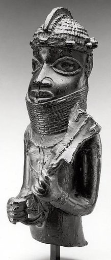 Court attendant with eben (ceremonial sword)