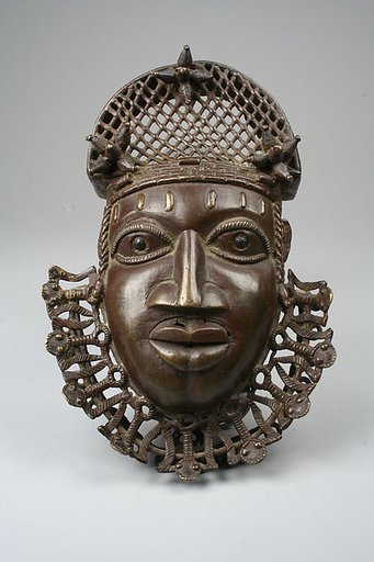 Hip ornament with face