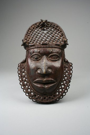 Hip ornament with face